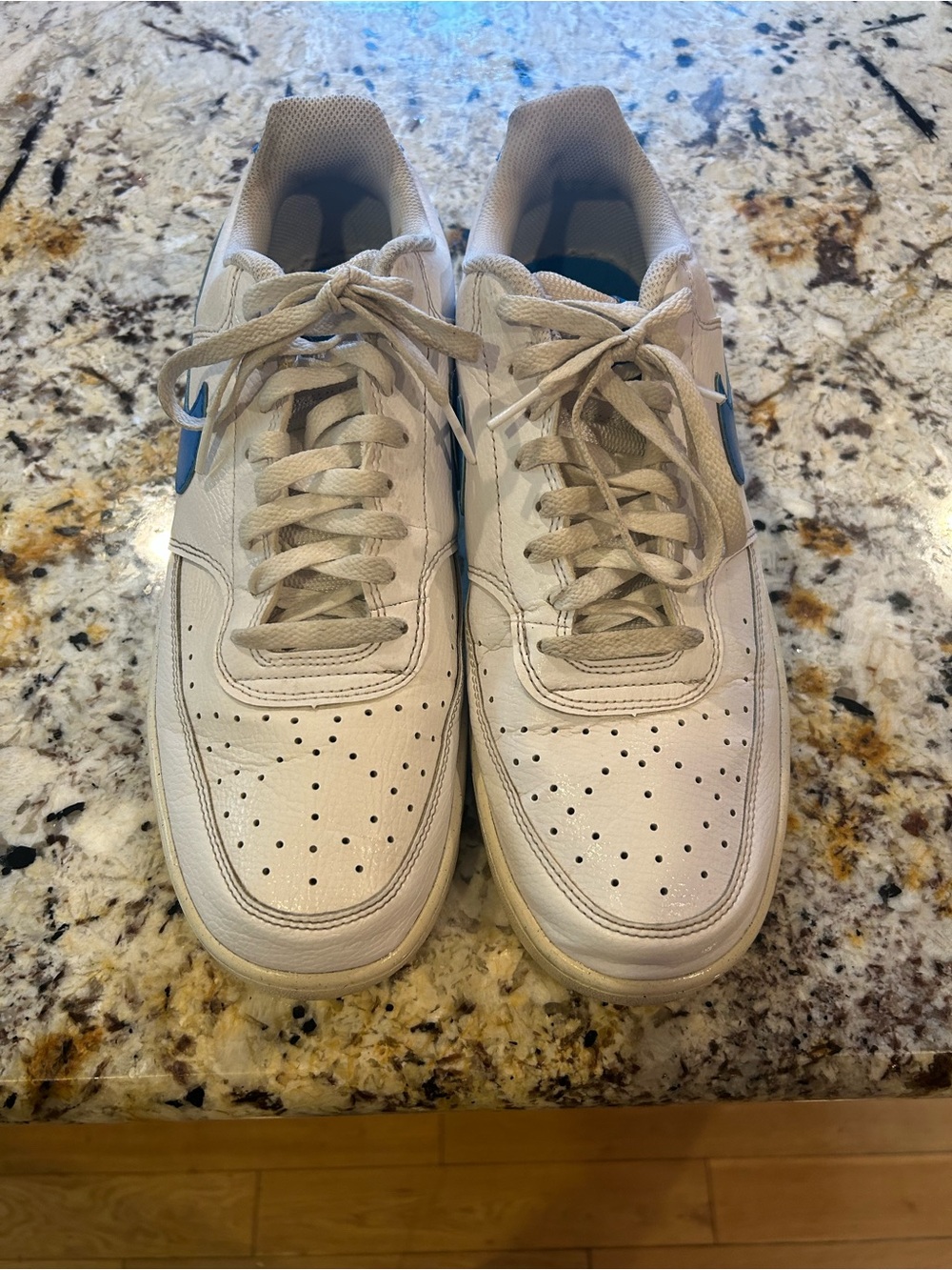 Nike White Sneakers with Light Blue Swoosh